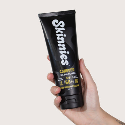 Skinnies CONQUER SPF50+ 200ml in hand