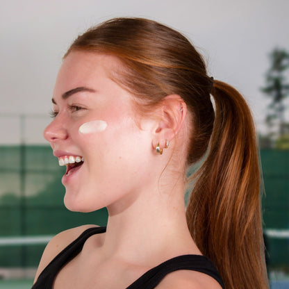 Skinnies CONQUER SPF50+ swatch on face