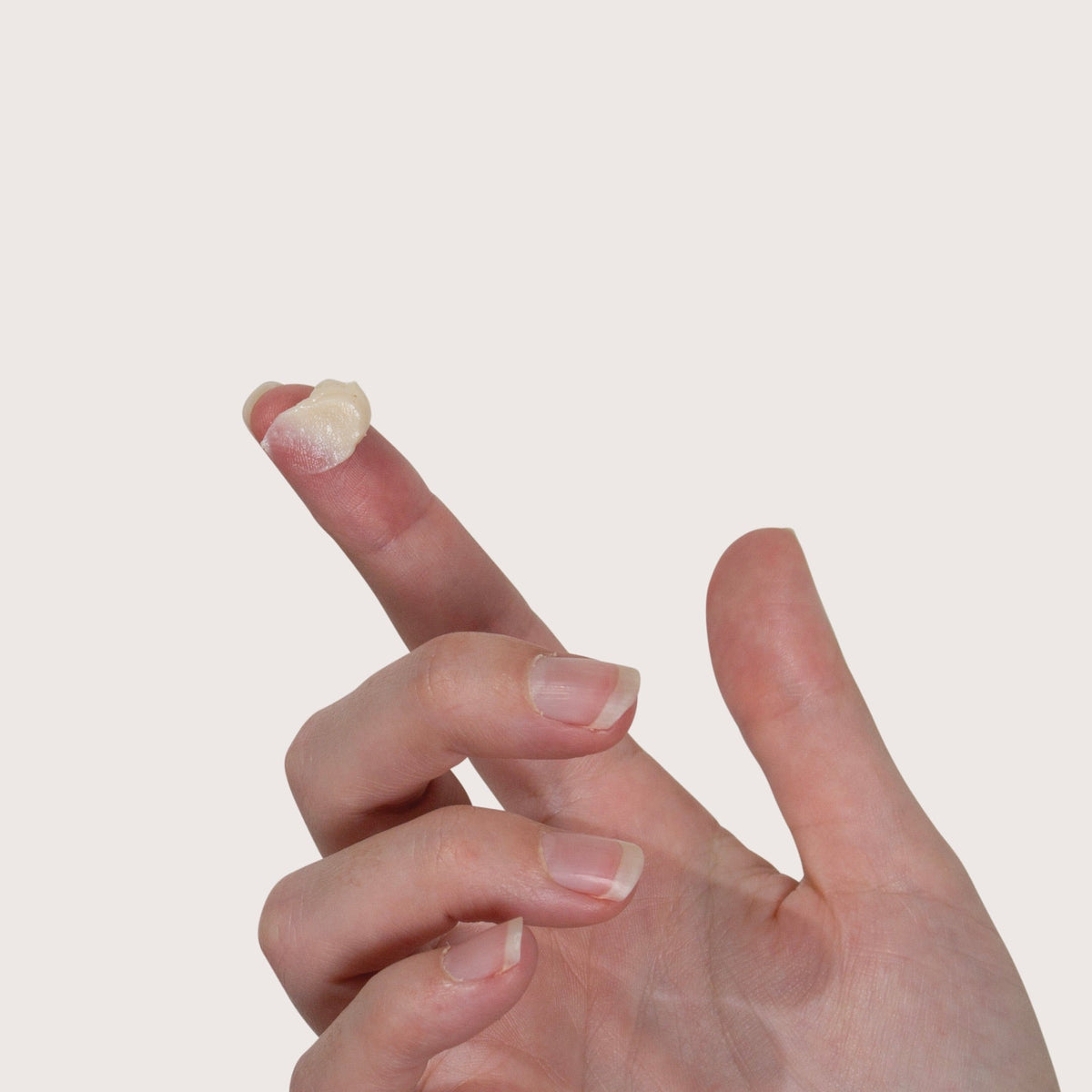 Skinnies CONQUER SPF50+ pea-size blob